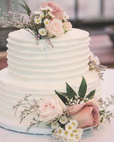 White Wedding Cake With Flowers